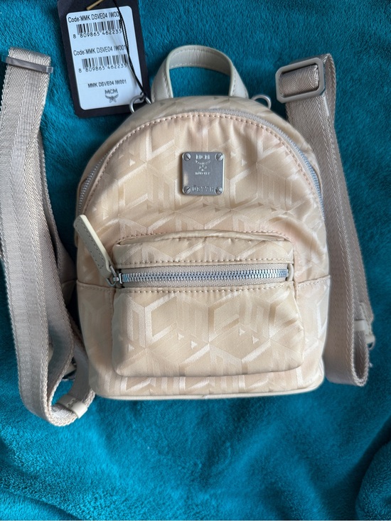 MCM Handbags - MCM Stark Beige Monogram Mini Backpack authentic